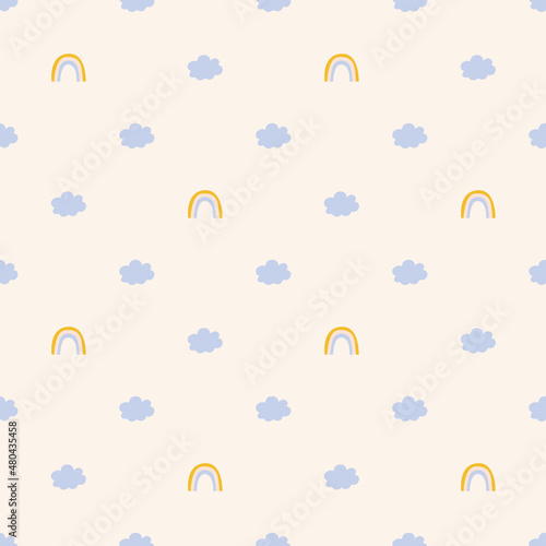 Seamless pattern with cute rainbows and clouds