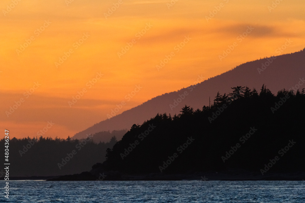 Coastal sunset layers near Tofino, Vancouver Island, B.C., Canada.