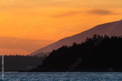 Coastal sunset layers near Tofino, Vancouver Island, B.C., Canada.