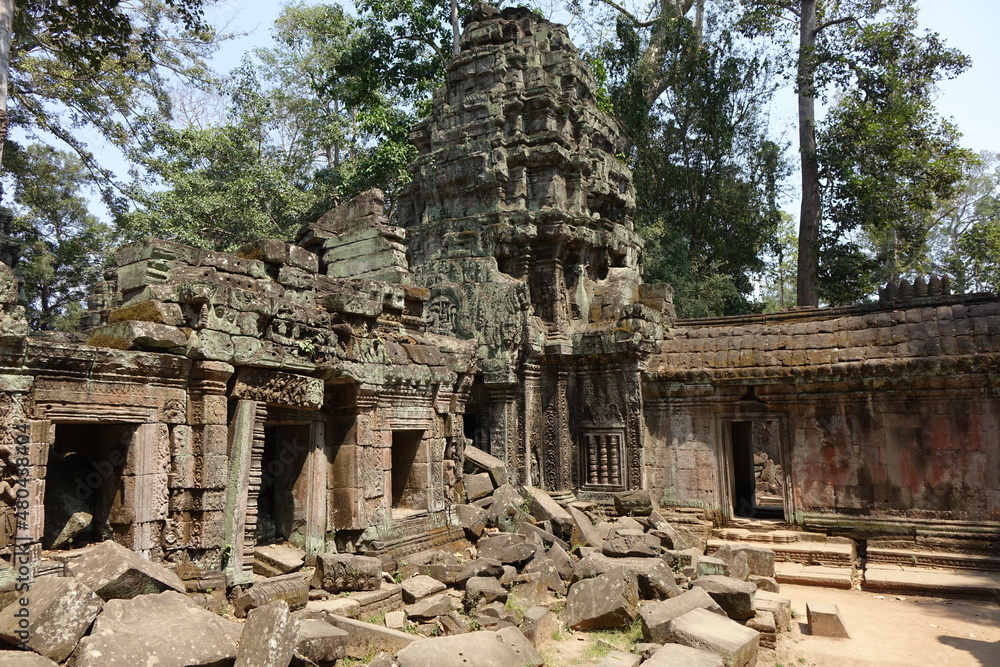 Adventure of exploring mystic Ta Prohm temple overgrown by jungle trees (horizontal image), Siem Reap, Cambodia