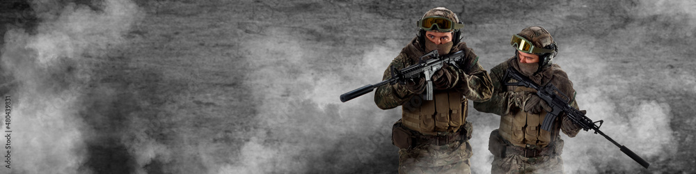 A mercenary soldiers during a special operation. Photo with copy space. Format photo 4x1. Collage - one model, in two poses. A mercenary soldiers during a special operation. Photo with copy space. Format photo 4x1. Collage - one model, in two poses.