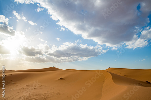 Sand dunes in Morocco. Erg Chebbi Sahara desert. Yellow red sand and blue sky. High quality photo