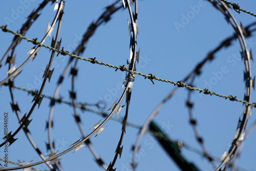 Barbed wire border fence and defense.