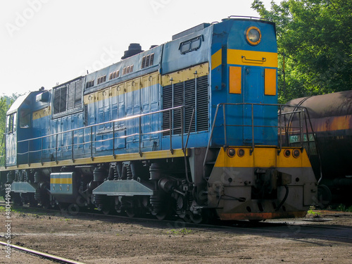 shunting diesel locomotive on railway rails of ferrous metallurgy 