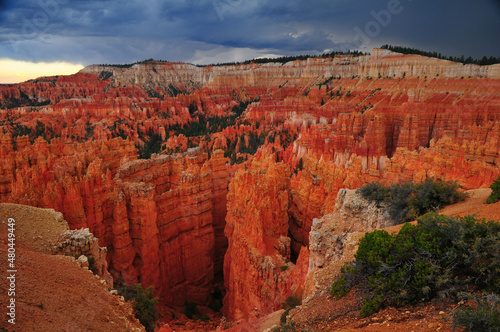 Moody, stormy late summer afternoon view of rock spires and hoodoos from Sunset Point, Bryce Canyon National Park, Utah, Southwest USA
