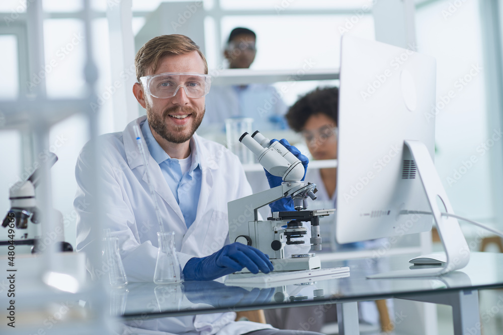 In a Modern Laboratory Research Scientist Conducts Experiments In a Modern Laboratory Research Scientist Conducts Experiments