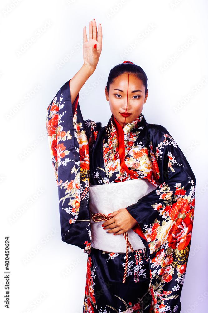 young pretty geisha in black kimono posing isolated on white background, asian ethno young pretty geisha in black kimono posing isolated on white background, asian ethno
