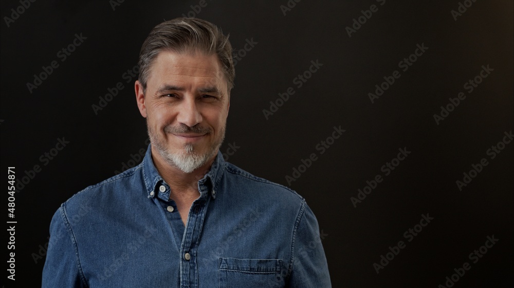 Portrait of mature age, middle age, mid adult man in 50s, happy confident smile. Copyspace. Portrait of mature age, middle age, mid adult man in 50s, happy confident smile. Copyspace.