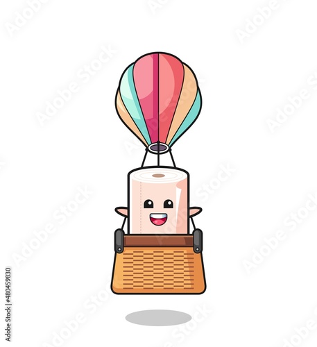 tissue roll mascot riding a hot air balloon