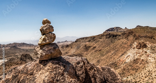 Balanced rocks before a canyon landscape environment.