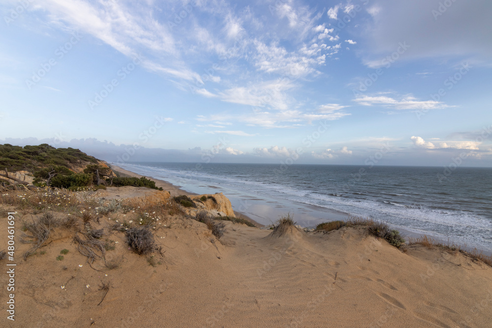 Mazagon beach, in the province of Huelva, Spain. One of the most beautiful beaches in Spain. Concept of going to the most beautiful places on vacation.