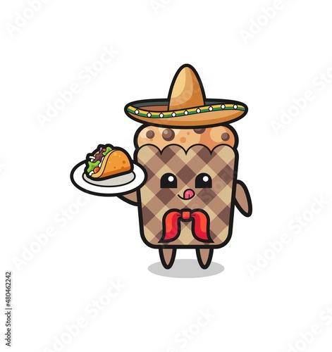 muffin Mexican chef mascot holding a taco