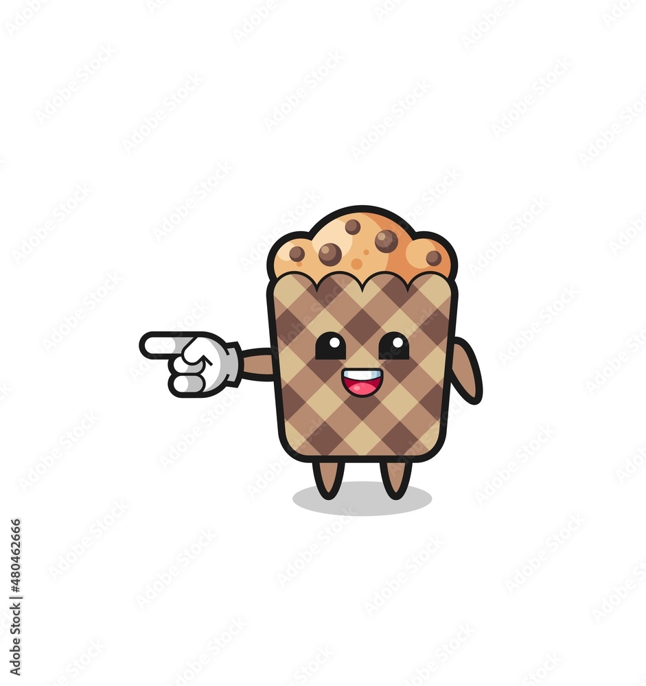 muffin cartoon with pointing left gesture