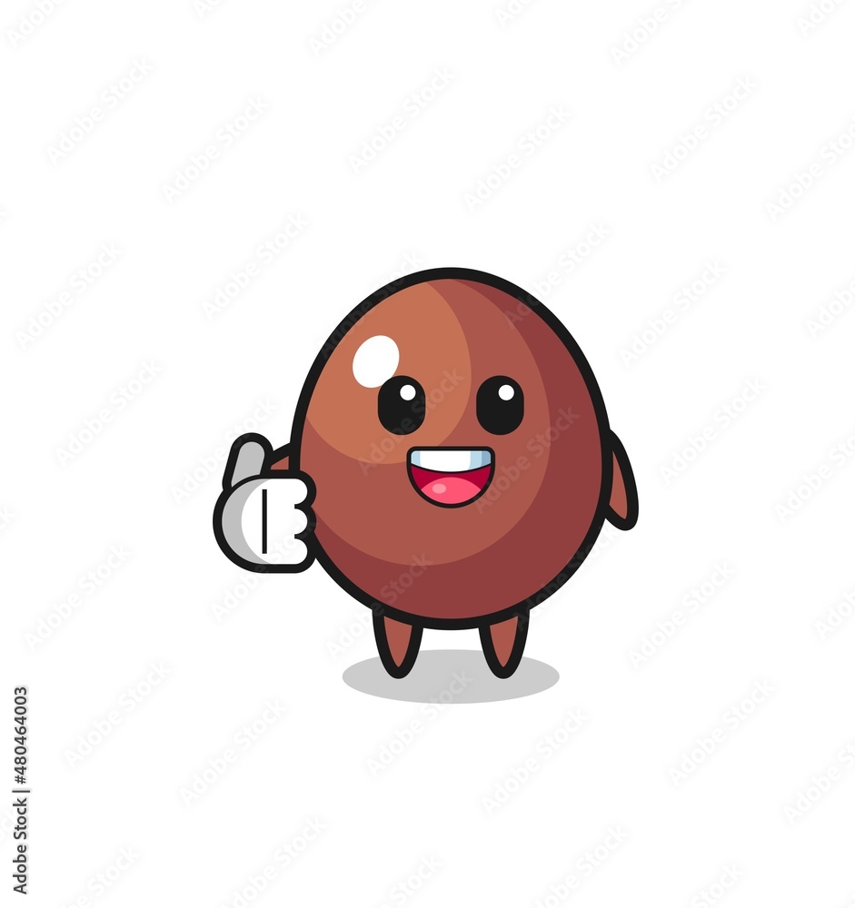 chocolate egg mascot doing thumbs up gesture chocolate egg mascot doing thumbs up gesture