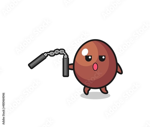 cartoon of chocolate egg using nunchaku