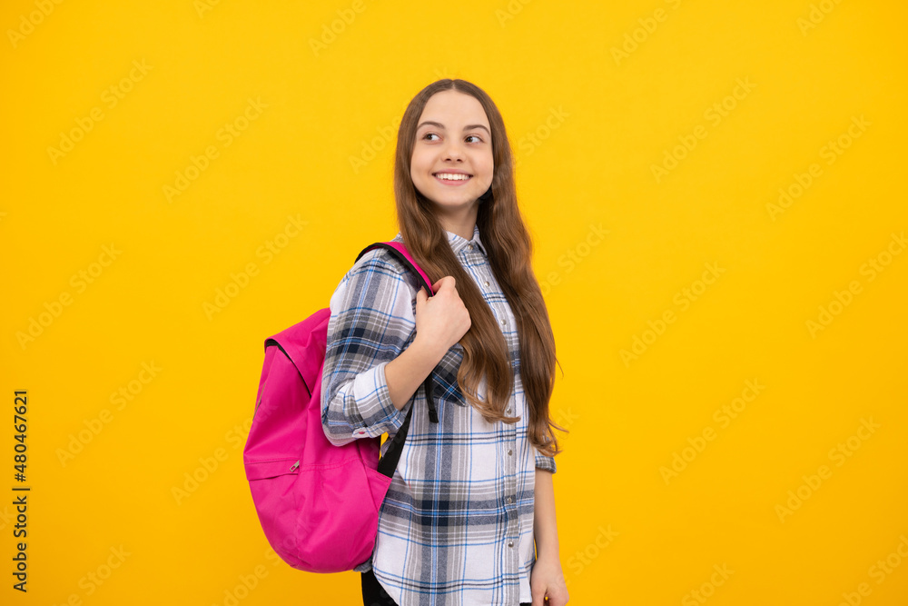 concept of education. kid in checkered shirt on yellow background. september 1. concept of education. kid in checkered shirt on yellow background. september 1.