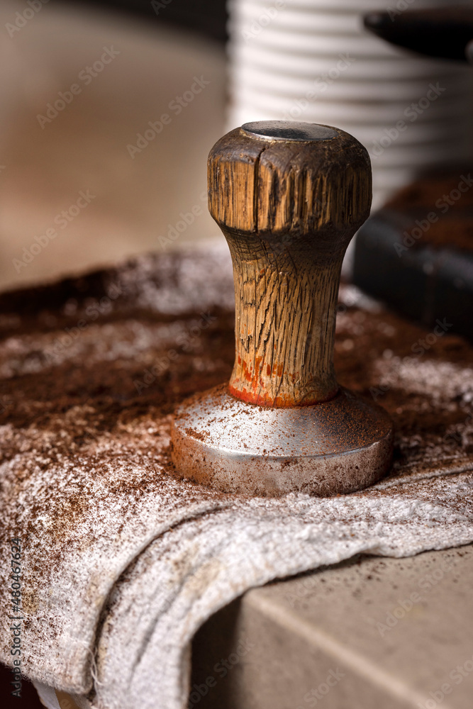 Coffee press being used to make Expresso at a coffee shop Coffee press being used to make Expresso at a coffee shop