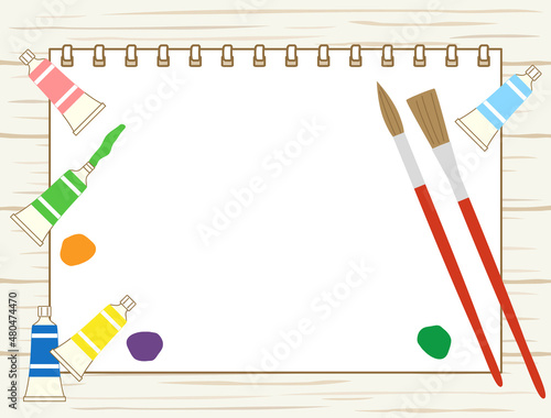 スケッチブックと絵具と筆のお絵かきイメージ