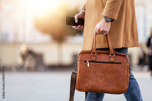 Businessman with briefcase outdoor