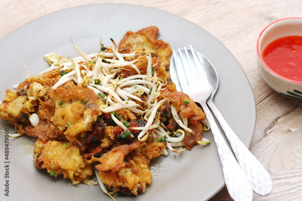 Oysters fried in egg batter, Pan-fried crispy mussel with bean sprout, Crispy Mussel and Beansprout Pancake Oysters fried in egg batter, Pan-fried crispy mussel with bean sprout, Crispy Mussel and Beansprout Pancake