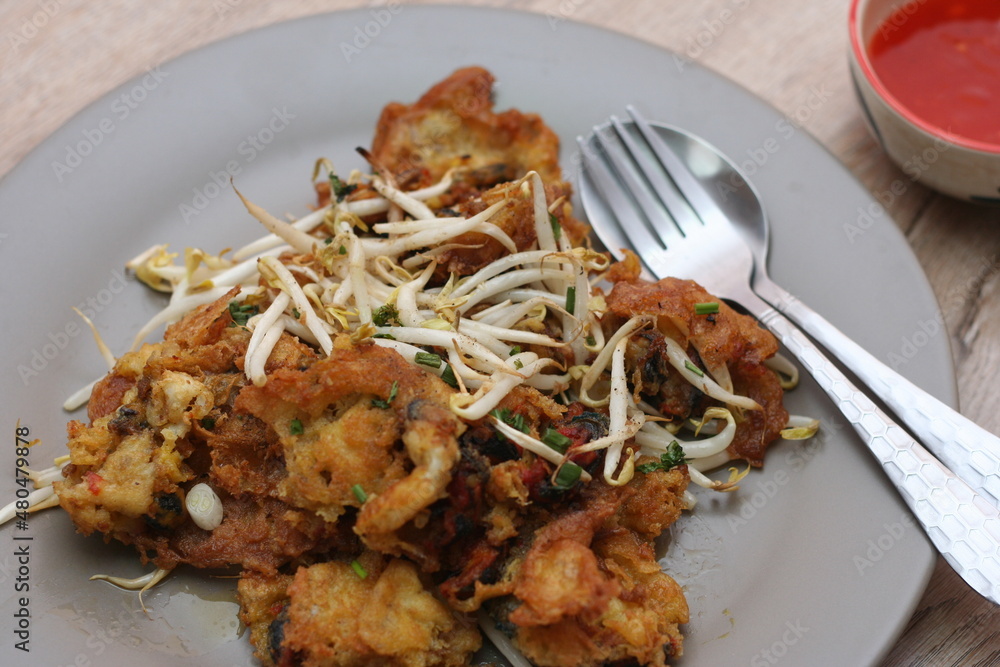 Oysters fried in egg batter, Pan-fried crispy mussel with bean sprout, Crispy Mussel and Beansprout Pancake Oysters fried in egg batter, Pan-fried crispy mussel with bean sprout, Crispy Mussel and Beansprout Pancake