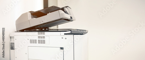 Copier printer, Close up the photocopier or photocopy machine office equipment workplace for scanner or scanning document and printing or copy paper duplicate and Xerox. photo