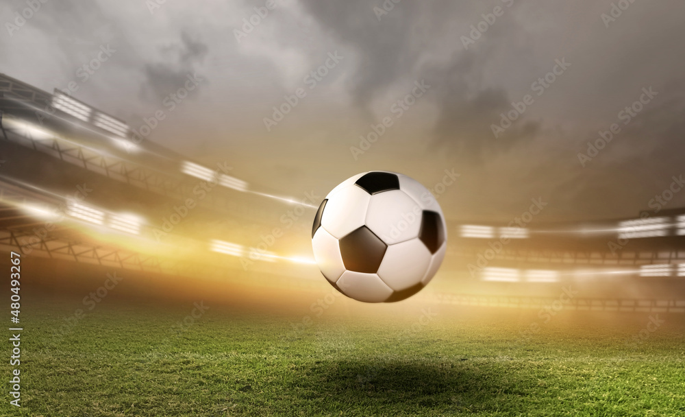 Soccer ball with football player kick off and moving under the spot ray light effects on green field, 3D illustration, of free space for texts and branding.