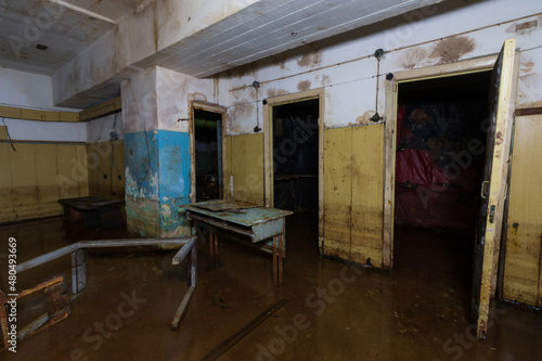 abandoned rotten shelter underground with equipment