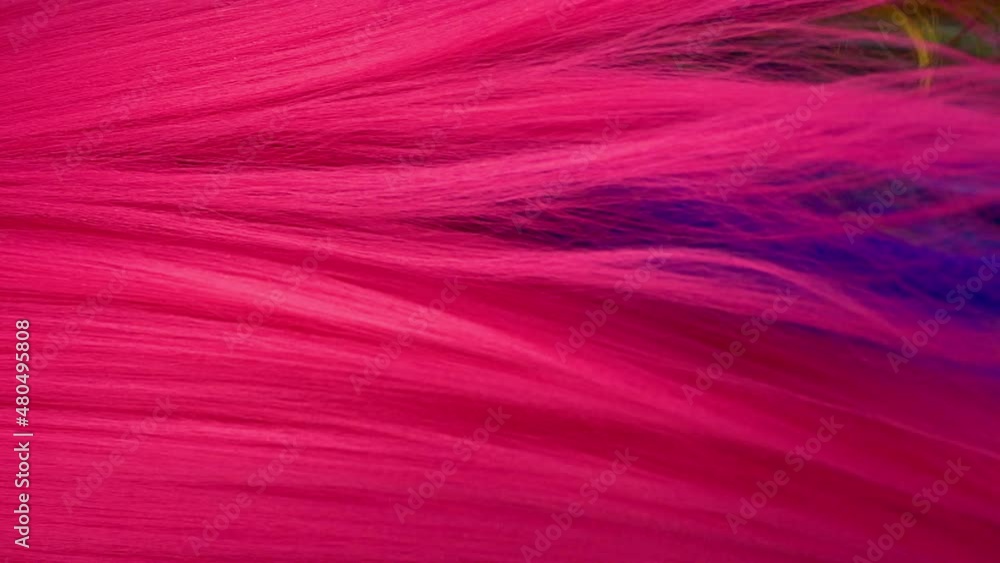 Slow motion waves of beautiful long smooth pink hair texture, hair coloring Slow motion waves of beautiful long smooth pink hair texture, hair coloring