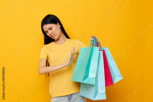pretty brunette fashion shopping posing isolated background unaltered