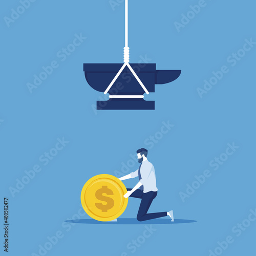 businessman picking up money coin on the floor with weight trap on top, money trap concept