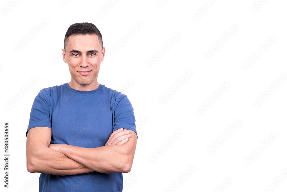 Man with arms crossed while smiling to the camera Man with arms crossed while smiling to the camera