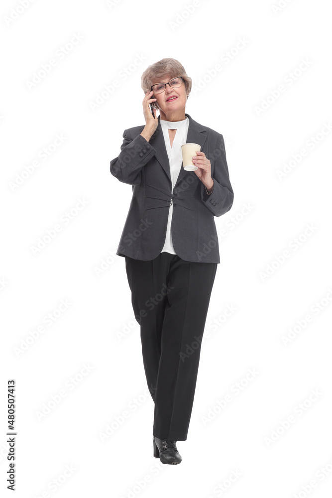 Positive senior businesswoman using smartphone Positive senior businesswoman using smartphone