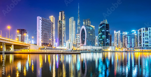 Panorama of night Dubai city skyline  UAE