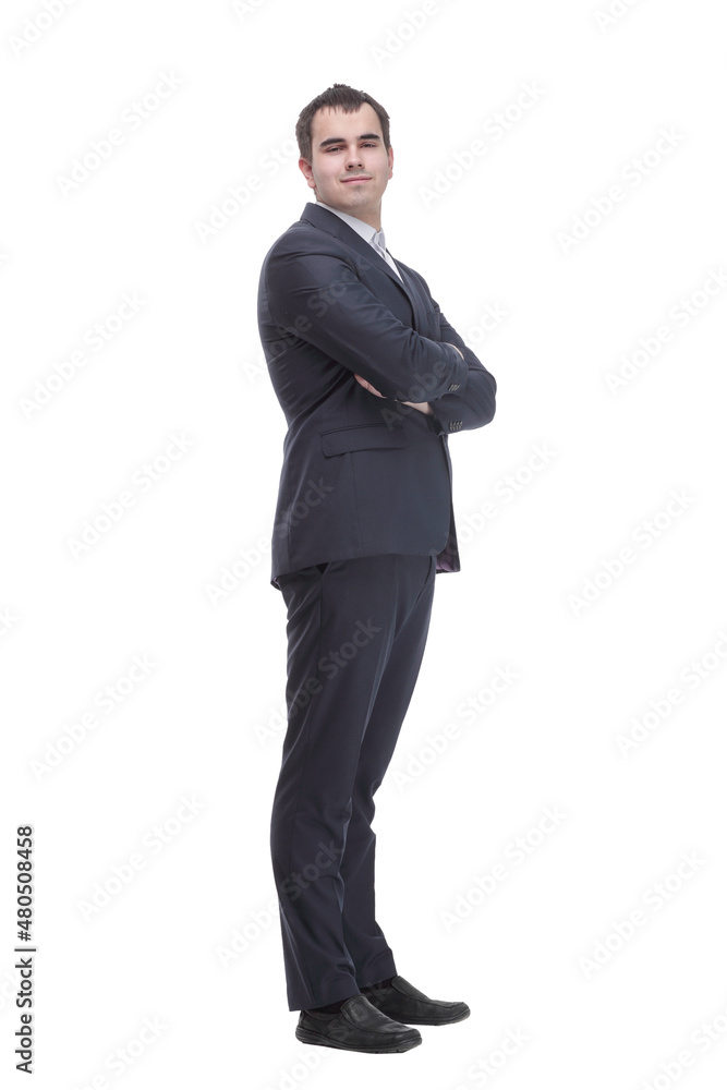 Side view of confident businessman with arms folded against white background Side view of confident businessman with arms folded against white background