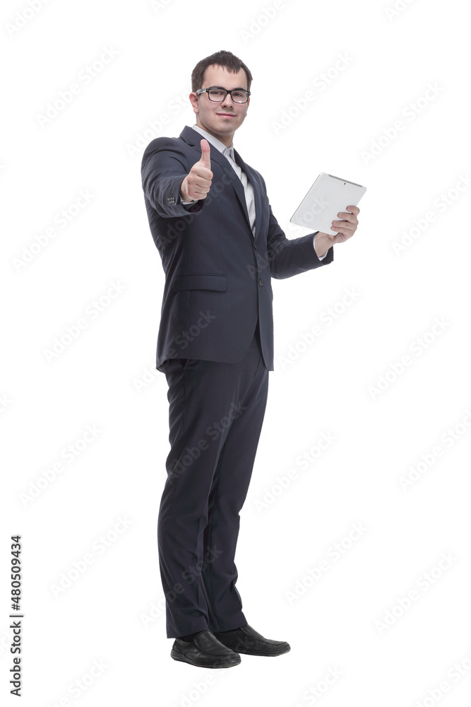 Side view portrait of curious and smiling businessman with tablet looking and pointing to side Side view portrait of curious and smiling businessman with tablet looking and pointing to side