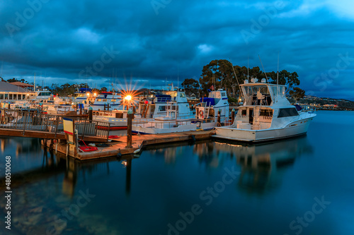 Fishing boats in Dana Point harbor, Orange county, Southern California at sunset