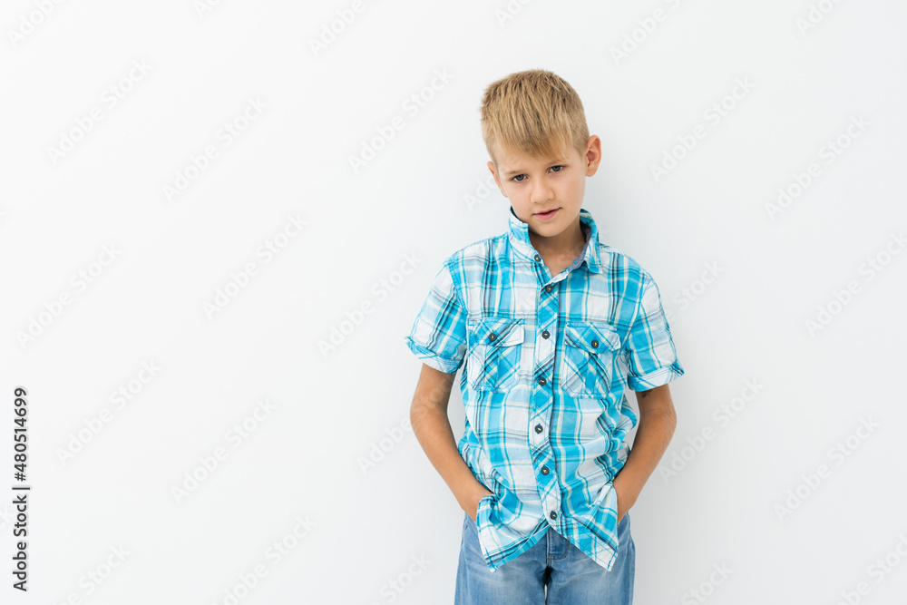 Photo of adorable young happy boy looking at camera. Photo of adorable young happy boy looking at camera.
