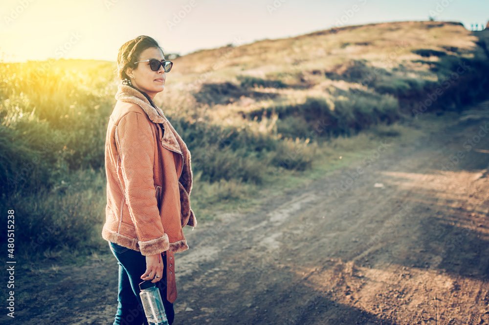 Close up of a young woman on the road, latin woman on a highway road, portrait of a woman on a road, woman on a road Close up of a young woman on the road, latin woman on a highway road, portrait of a woman on a road, woman on a road