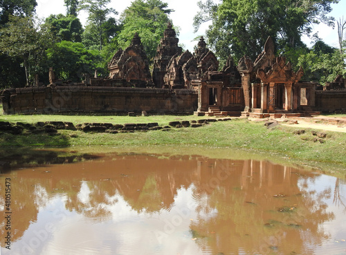 Fototapeta Naklejka Na Ścianę i Meble -  Banteay Srey is a 10th-century Cambodian temple dedicated to the Hindu god Shiva. Located in the area of Angkor, it lies near the hill of Phnom Dei.    
