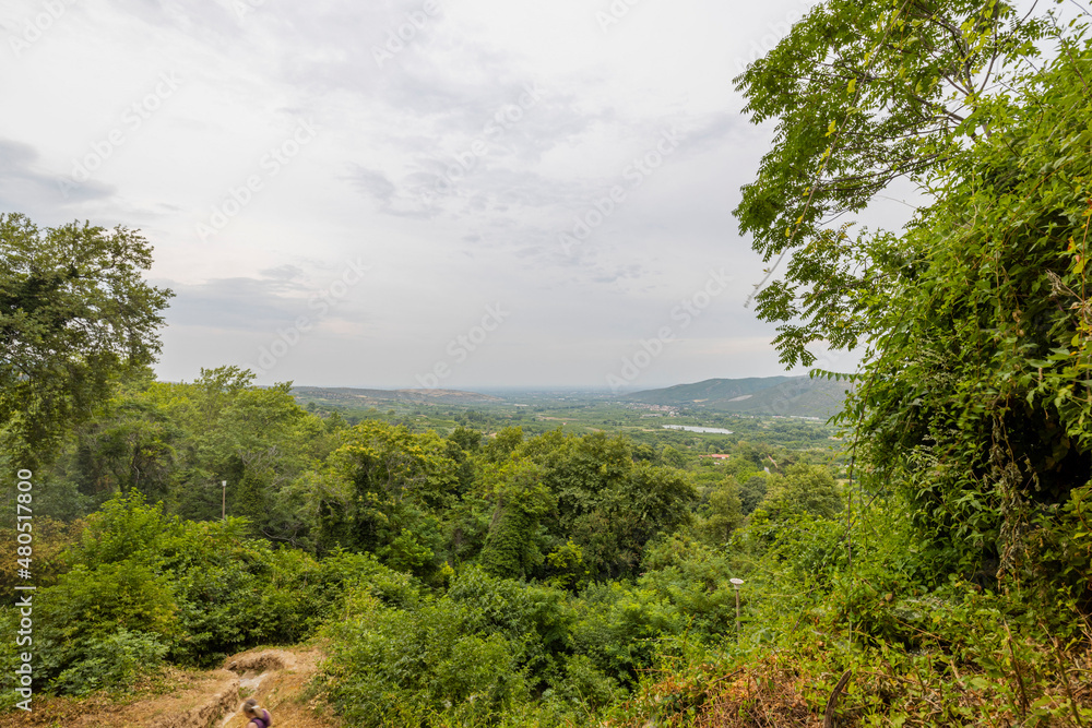 Beautiful green nature mountain landscape view on pale sky background. Greece. Beautiful green nature mountain landscape view on pale sky background. Greece.
