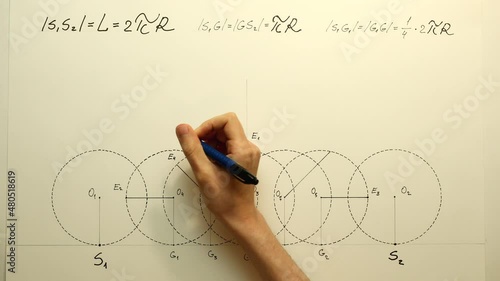 Young mathematician hand marks a points 