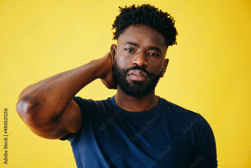 thoughtful black Man With Hand On Beard close-up studio indoors thoughtful black Man With Hand On Beard close-up studio indoors