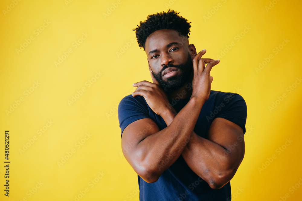 Confident Muscular Afro Man With Hands Crossed Confident Muscular Afro Man With Hands Crossed