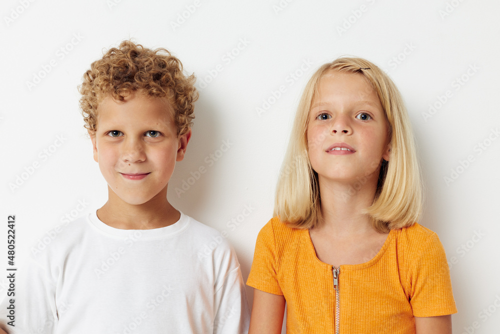 cheerful children casual clothes posing emotions studio isolated background unaltered cheerful children casual clothes posing emotions studio isolated background unaltered