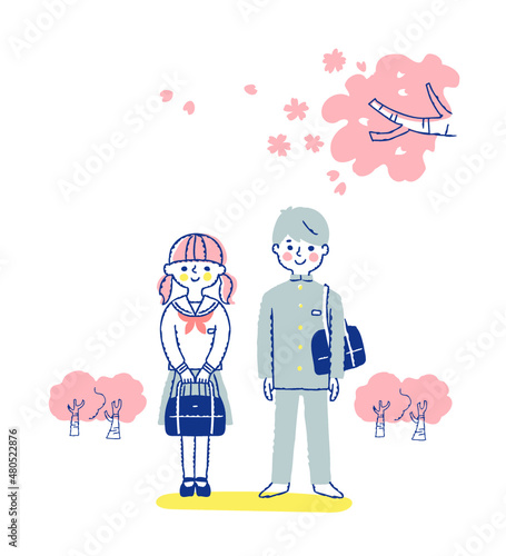 中学生の男女と桜