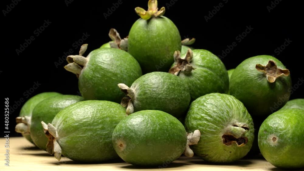 Acca sellowiana fruit (feijoa) rotation background. Close up Acca sellowiana fruit (feijoa) rotation background. Close up