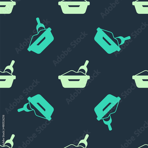 Green and beige Cat litter tray with shovel icon isolated seamless pattern on blue background. Sandbox cat with shovel. Vector