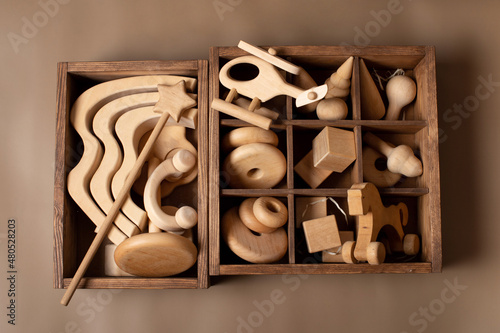 wooden toys, a set of wooden toys in a box