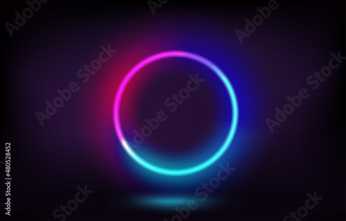 Dark stage with vibrant neon circle